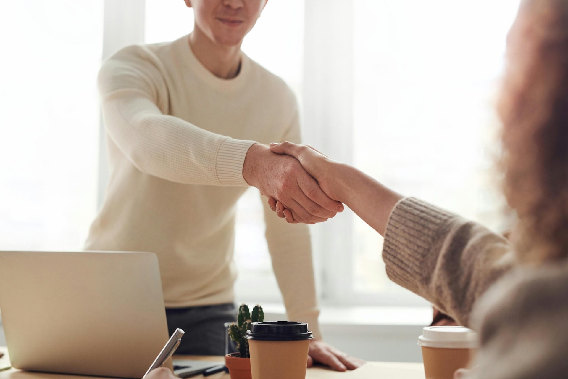 A photo of two people in an interview